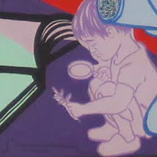 Child examining leaf